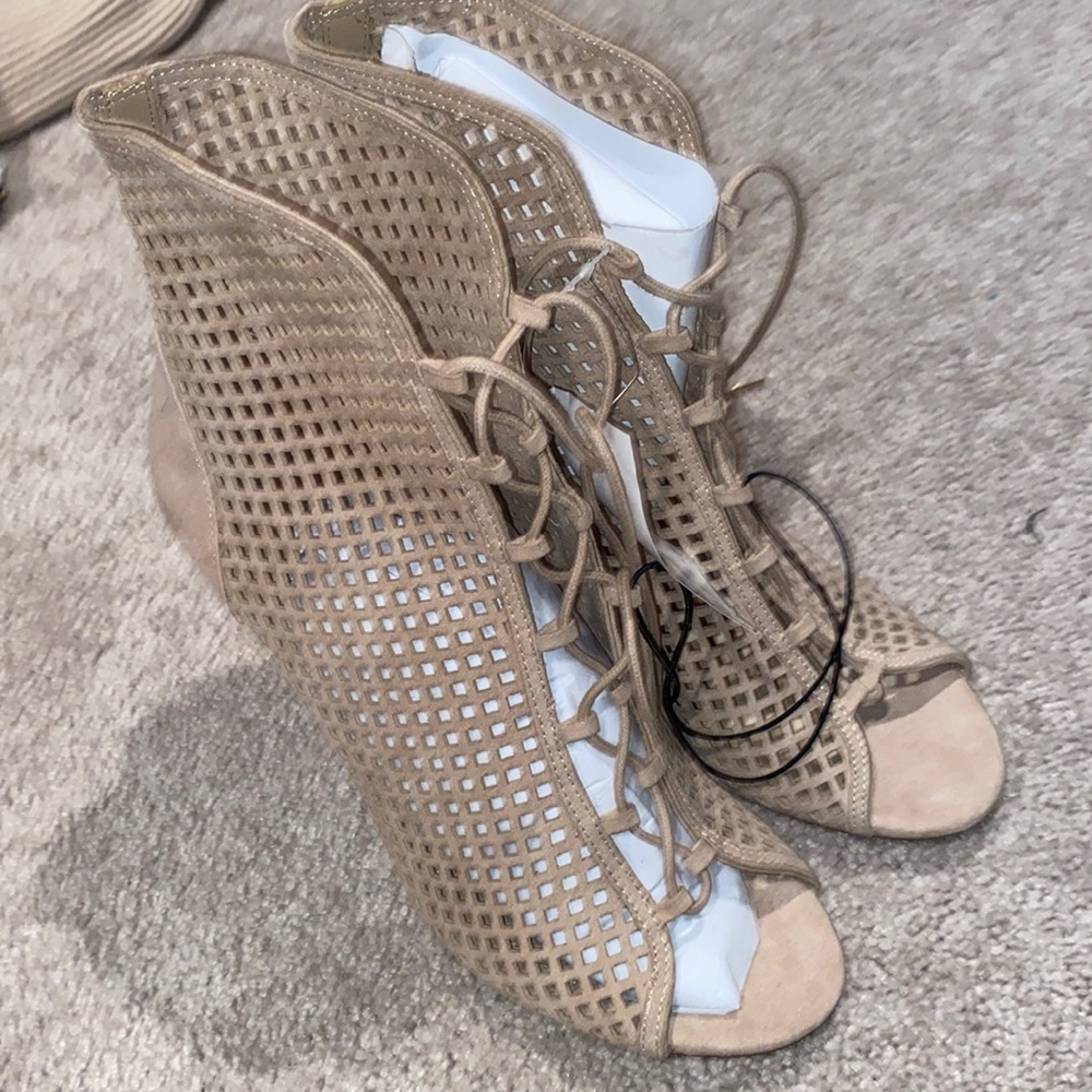 Tan lace up booties size 9.5